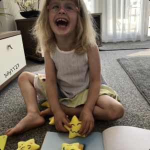 child playing with her Mood Stars