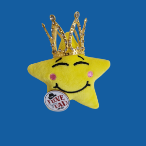 Happy Star wears a golden crown and holds a Happy Fathers Day badge